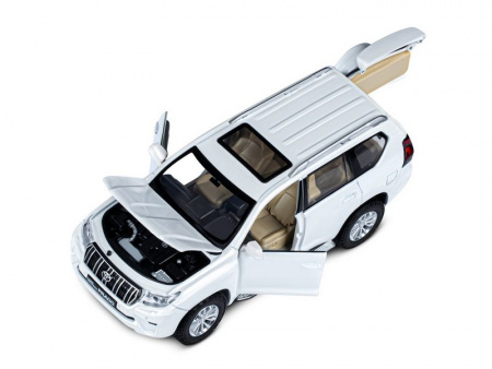 Фото Машина "АВТОПАНОРАМА" Land Cruiser Prado, 1/24, белый, свет, звук, в/к 24,5х12,5х10,5 см | Инномарт