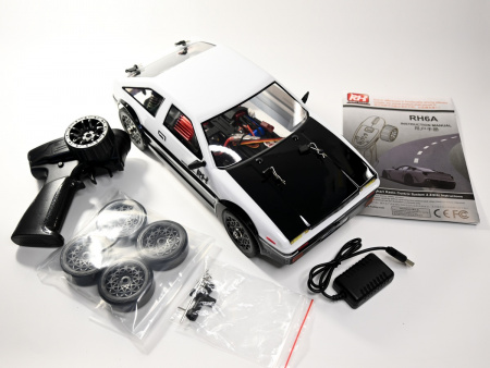 Фото Радиоуправляемая машина для дрифта Remo Hobby RACING & DRIFT (бело-черная) 4WD 2.4G 1/14 RTR | Инномарт