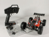 Фото Радиоуправляемая багги Remo Hobby Dingo V2.0 (красный) 4WD 2.4G 1/16 RTR | Инномарт
