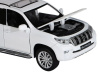 Фото Машина "АВТОПАНОРАМА" Land Cruiser Prado, белый, 1/32, свет, звук, инерция, в/к 17,5*13,5*9 см | Инномарт